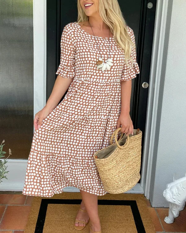 Estrella| Relaxed midi dress with polka dots and short sleeves
