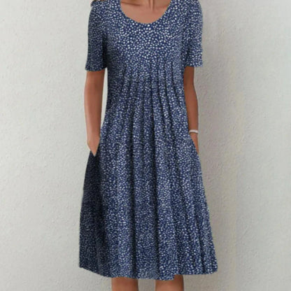 Clara | Damen Midi-Kleid mit Blumenmuster, kurzen Ärmeln und Taschen