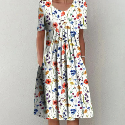Clara | Damen Midi-Kleid mit Blumenmuster, kurzen Ärmeln und Taschen