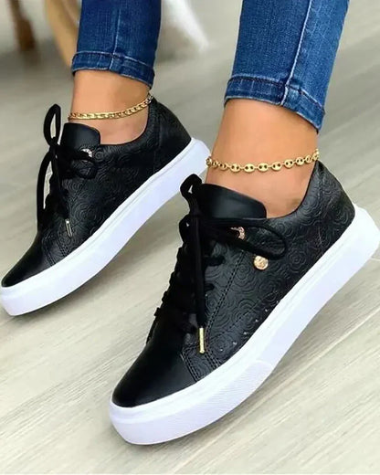 Selira | Sneakers with gold details and white laces