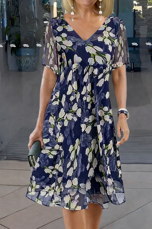Velina | Vestido mini con estampado floral y escote en V
