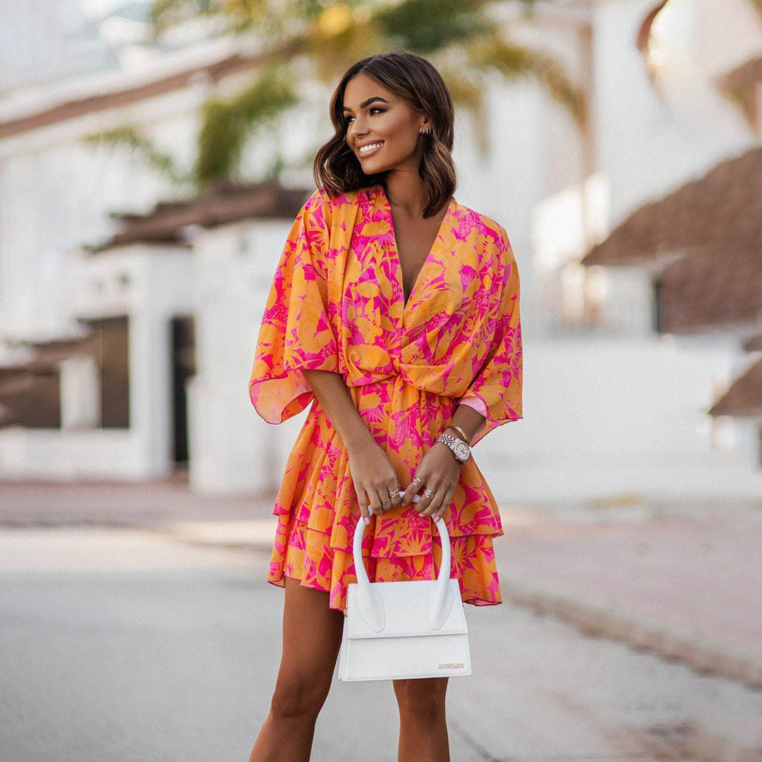 Lola | Chic mini dress with V-neck and floral print