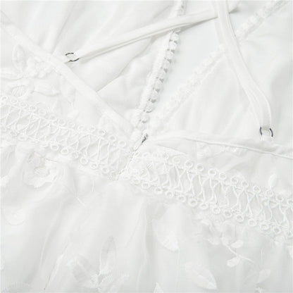 Felicidad | Robe élégante avec broderie florale et fines bretelles