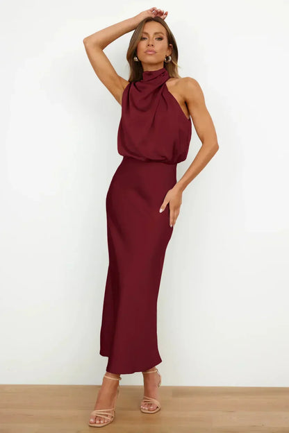Laura | Vestido de noche de mujer chic con cuello halter y corte fluido