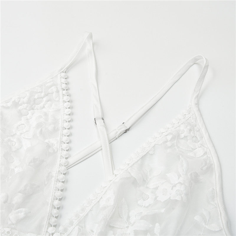 Felicidad | Robe élégante avec broderie florale et fines bretelles